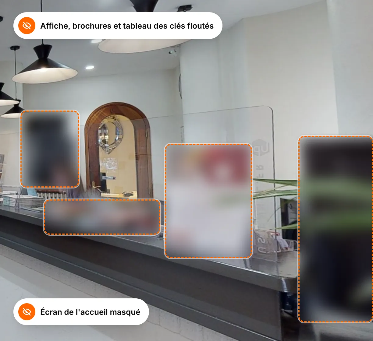 A hotel reception seen in its virtual tour, with the poster, brochures, key board and screen blurred