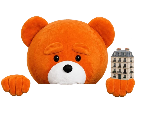 The easyVirtual.tours bear, the brand mascot, dressed for the trade, gripping the edge of the card